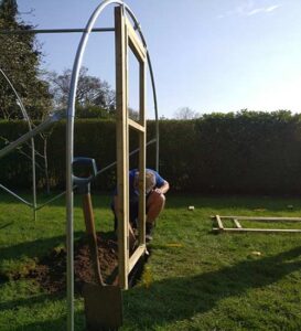 Polytunnel Installation - Frame and door sunk into garden